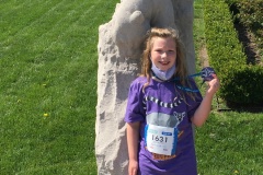 She earned her medal!  Happy Girl!